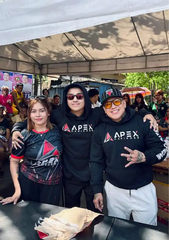 Apex Gaming 88 featuring team members at a community event in online casino Philippines.